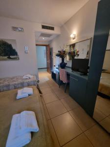A bed or beds in a room at Ariete