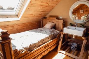Postel nebo postele na pokoji v ubytování Les Gîtes de Sprimont - Le Cottage