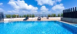 a swimming pool on the roof of a building at Serene Hills Home in Nairobi