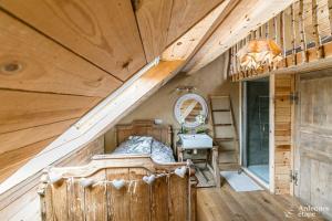 Postel nebo postele na pokoji v ubytování Les Gîtes de Sprimont - Le Cottage + 37 fotografií