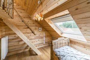 Postel nebo postele na pokoji v ubytování Les Gîtes de Sprimont - Le Cottage