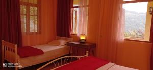 Letto o letti in una camera di GUEST HOUSE RIMAS HOME