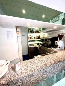 Kuchyň nebo kuchyňský kout v ubytování Hotel Staccoli
