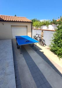 Stolný tenis v ubytovaní Belle villa avec piscine vue montagne à 10 mn de la mer à Argeles alebo v jeho okolí