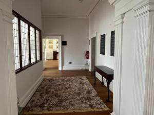 Postel nebo postele na pokoji v ubytování Sonas Mount Trenchard
