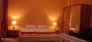 Letto o letti in una camera di GUEST HOUSE RIMAS HOME