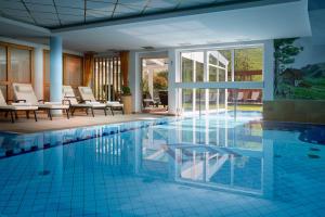 Bazén v ubytování Vitalpina Hotel Magdalenahof nebo v jeho okolí