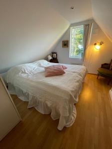 Postel nebo postele na pokoji v ubytování Lilla Villan