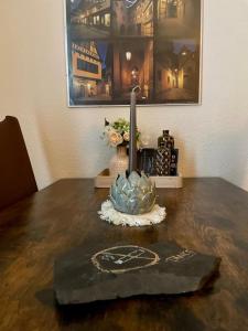 a candle sitting on top of a wooden table at "Erfurt genießen" in Erfurt