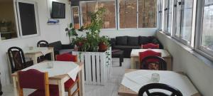 Area soggiorno di guesthouse emaly