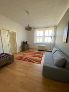 Postel nebo postele na pokoji v ubytování Apartmán na náměstí