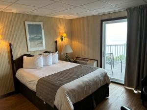 Postel nebo postele na pokoji v ubytování Motel vue Belvédère