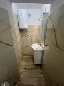 Un baño de JS apartmani