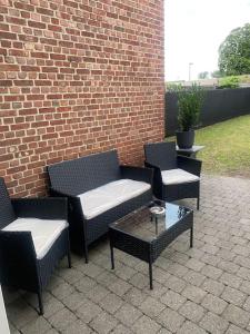 Posezení v ubytování E&L Appartement