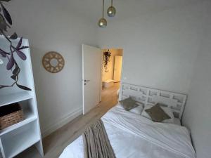 Postel nebo postele na pokoji v ubytování E&L Appartement