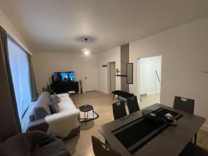 TV a/nebo společenská místnost v ubytování E&L Appartement