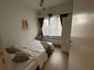 Postel nebo postele na pokoji v ubytování E&L Appartement