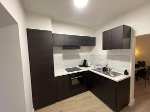Kuchyň nebo kuchyňský kout v ubytování E&L Appartement