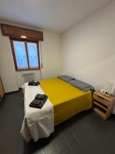 Tempat tidur dalam kamar di Casa Di Pane