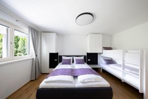 Postel nebo postele na pokoji v ubytování DU.Appartement