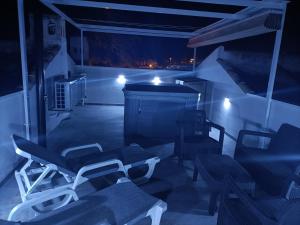 A seating area at DUPLEX NOSY BE vue sur mer avec solarium et jacuzzi