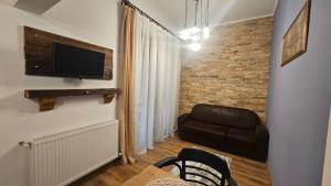 Μια τηλεόραση ή/και κέντρο ψυχαγωγίας στο Piața Unirii - Yulia`s Ultra-Central Retreat