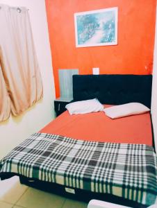 En eller flere senge i et værelse på Hostel Bryan Tatuapé