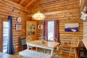 A seating area at Pet-Friendly New York Cabin with Hot Tub and Game Room