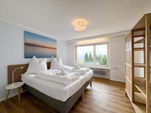 Postel nebo postele na pokoji v ubytování Ferienhaus mit Aussicht