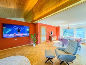 TV a/nebo společenská místnost v ubytování Ferienhaus mit Aussicht