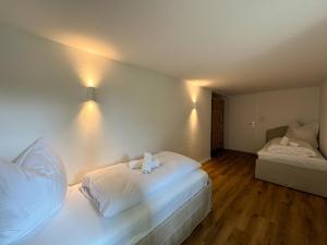 Postel nebo postele na pokoji v ubytování Ferienhaus mit Aussicht