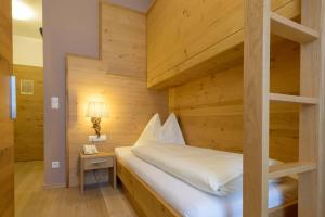 Postel nebo postele na pokoji v ubytování Posthotel Radstadt