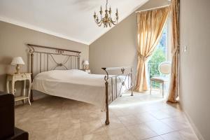 Ένα ή περισσότερα κρεβάτια σε δωμάτιο στο Majestic Vista Apartment