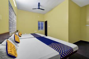 Fotografie z fotogalerie ubytování Hotel O Balajii Residency v destinaci Kójamputtúr