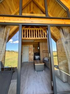 a view of the living room of a tiny house at Eternum Glamping in Žabljak