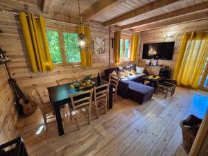 an overhead view of a living room and dining room at Holiday home LUNA in Donje Orešje