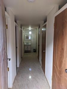 an empty hallway with a hallwayngthngthngthngthngthngthngthngthngthngth at Wadi Rum Majestic Camp in Wadi Rum