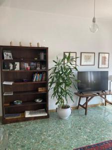 A television and/or entertainment centre at Attico San Francesco