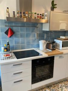 A kitchen or kitchenette at Attico San Francesco