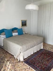 A bed or beds in a room at Attico San Francesco