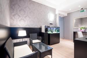 TV a/nebo společenská místnost v ubytování Happy Holiday in Rome b&b