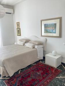 A bed or beds in a room at Attico San Francesco