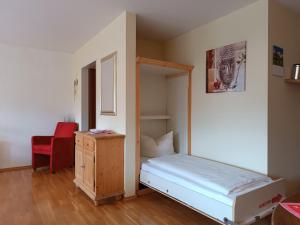 Postel nebo postele na pokoji v ubytování Alpenglühen - Hallenbad & Sauna + 8 fotografií