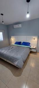 En eller flere senge i et værelse på Casa de Descanso Valle Escondido