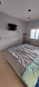 En eller flere senge i et værelse på Casa de Descanso Valle Escondido + 5 billeder