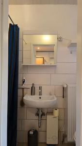 Ένα μπάνιο στο 1 Zimmer Apartment klimatisiert