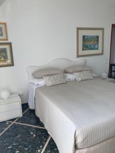 A bed or beds in a room at Attico San Francesco