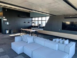 Istumisnurk majutusasutuses LOFT confortável e moderno com garagem perto da FURB e Vila Germânica
