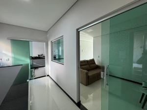 Kuchyň nebo kuchyňský kout v ubytování CASA MARAVILHOSA COMPLETa