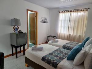 Halley View Summer House客房内的一张或多张床位